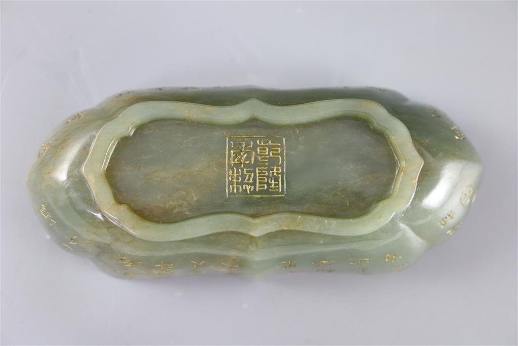 A Chinese inscribed green jade brushwasher, 16cm wide